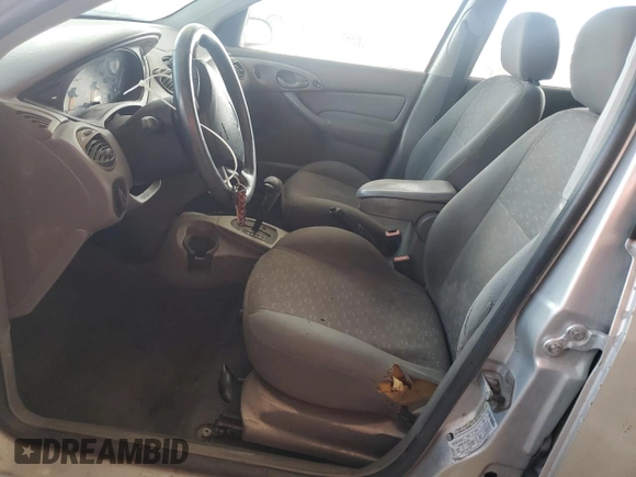 2004 Ford Focus ZX5 z VIN 3FAFP37394R122388, wystawiony jako Copart lot #45163225 z przebiegiem 259 554 mil mil oraz Czysty tytuł • Clean title. Historia ofert i sprzedaży dostępna na DreamBid. Obrazek 7.
