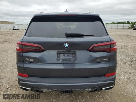 2021 BMW X5 xDrive40i with VIN 5UXCR6C01M9E49207, listed as a Copart auction lot 63399795 with 50,818 mi miles and Salvage title. Bid and sale history available at DreamBid. Image 6.