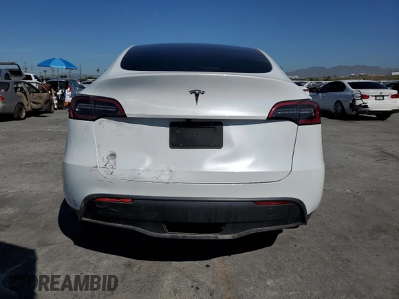 2024 Tesla Model Y with VIN 7SAYGDED5RF196309, listed as a Copart auction lot 44608545 with 7,226 mi miles and Salvage Title. Bid and sale history available at DreamBid. Image 6.