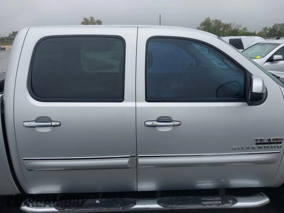 2013 Chevrolet Silverado 1500 LT with VIN 3GCPCSE06DG302775, listed as a IAAI auction lot 41903005 with 409,637 mi miles and . Bid and sale history available at DreamBid. Image 13.