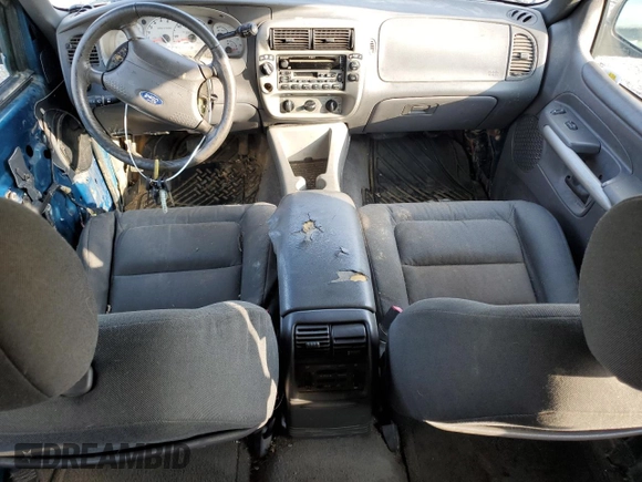 2001 Ford Explorer Sport z VIN 1FMYU70E21UC58568, wystawiony jako Copart lot #52003165 z przebiegiem 185 064 mil mil oraz Czysty tytuł • Clean title. Historia ofert i sprzedaży dostępna na DreamBid. Obrazek 8.