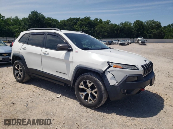 2016 Jeep Cherokee Trailhawk with VIN 1C4PJMBS3GW102000, listed as a Copart auction lot 60866505 with 120,985 mi miles and Salvage title. Bid and sale history available at DreamBid. Image 4.