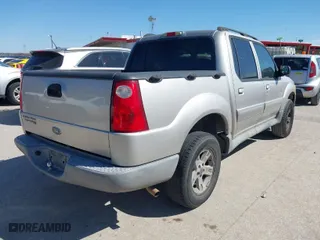2005 Ford Explorer Sport Trac XLS with VIN 1FMZU67K75UA18027, listed as a IAAI auction lot 41694106 with 144,900 mi miles. Bid and sale history available at carsss.com. Image 4.