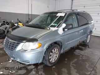 2006 Chrysler Town & Country LWB Touring with VIN 2A4GP54L66R887821, listed as a IAAI auction lot 41578005 with 133,082 mi miles. Bid and sale history available at carsss.com. Image 2.