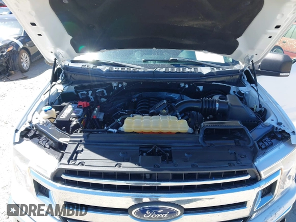 2018 Ford F-150 XL with VIN 1FTFX1C57JKF08037, listed as a IAAI auction lot 41863806 with 195,725 mi miles and . Bid and sale history available at DreamBid. Image 10.