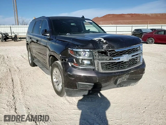 2015 Chevrolet Tahoe LS with VIN 1GNSCAKC5FR501801, listed as a Copart auction lot 50850645 with 112,896 mi miles and Salvage title. Bid and sale history available at DreamBid. Image 12.