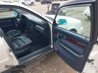 1996 Audi A6 z VIN WAUJA84A9TN106938, wystawiony jako IAAI lot #42287751 z przebiegiem 163 427 mil mil oraz . Historia ofert i sprzedaży dostępna na DreamBid. Obrazek 5.
