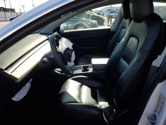 2020 Tesla Model 3 Standard Range Plus with VIN 5YJ3E1EA4LF803986, listed as a Copart auction lot 45395045 with 95,624 mi miles and Salvage Title. Bid and sale history available at carsss.com. Image 7.