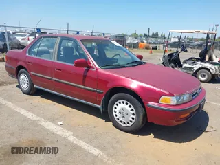 1992 Honda Accord LX z VIN JHMCB7655NC005251, wystawiony jako IAAI lot #42164428 z przebiegiem 157 058 mil mil oraz . Historia ofert i sprzedaży dostępna na DreamBid. Obrazek 1.