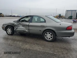 2001 Mercury Sable LS with VIN 1MEHM55SX1G608761, listed as a Copart auction lot 43158475 with 184,120 mi miles and Salvage Title. Bid and sale history available at DreamBid. Image 2.