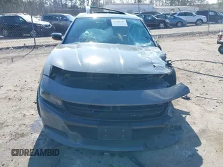 2019 Dodge Charger SXT with VIN 2C3CDXJG1KH537825, listed as a IAAI auction lot 41482387 with 71,062 mi miles and . Bid and sale history available at DreamBid. Image 11.