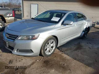 2014 Chevrolet Impala LT with VIN 1G1115SL1EU112255, listed as a IAAI auction lot 41753176 with 69,583 mi miles and . Bid and sale history available at DreamBid. Image 2.
