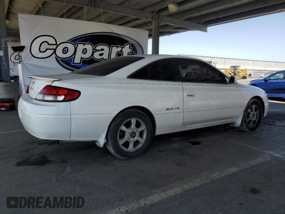 1999 Toyota Solara SE z VIN 2T1CF22P4XC171139, wystawiony jako Copart lot #58728195 z przebiegiem 148 703 mil mil oraz Szkoda całkowita • Salvage title. Historia ofert i sprzedaży dostępna na DreamBid. Obrazek 3.