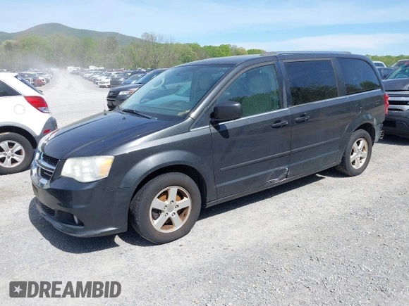 2011 Dodge Grand Caravan Crew with VIN 2D4RN5DG1BR790613, listed as a IAAI auction lot 42106380 with 188,528 mi miles and . Bid and sale history available at DreamBid. Image 2.
