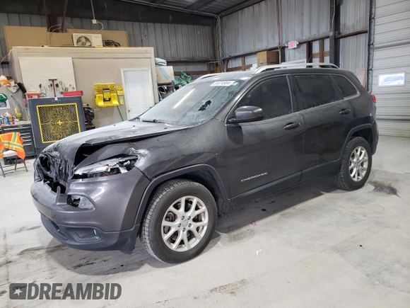 2015 Jeep Cherokee Latitude with VIN 1C4PJMCS7FW504728, listed as a Copart auction lot 81674984 with 144,342 mi miles and Salvage Title. Bid and sale history available at carsss.com. Image 1.