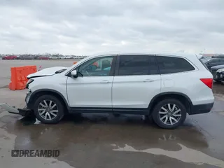 2021 Honda Pilot EX-L with VIN 5FNYF6H55MB031305, listed as a IAAI auction lot 41476636 with 58,754 mi miles. Bid and sale history available at carsss.com. Image 15.