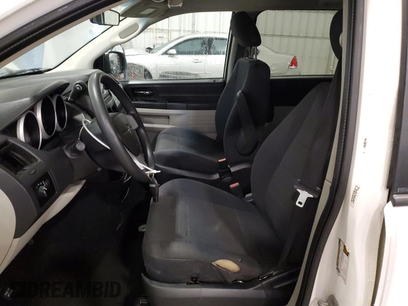 2009 Dodge Grand Caravan SE z VIN 2D8HN44E99R542025, wystawiony jako Copart lot #61003595 z przebiegiem 222 476 mil mil oraz Szkoda całkowita • Salvage title. Historia ofert i sprzedaży dostępna na DreamBid. Obrazek 7.
