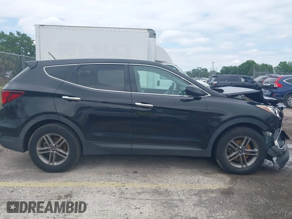 2018 Hyundai Santa Fe 2.4L with VIN 5XYZT3LB5JG539917, listed as a IAAI auction lot 41975300 with 214,562 mi miles and . Bid and sale history available at DreamBid. Image 13.