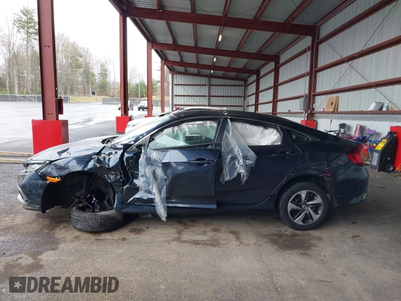 2019 Honda Civic Sedan LX with VIN 19XFC2F6XKE201052, listed as a IAAI auction lot 41961558 with 94,149 mi miles. Bid and sale history available at carsss.com. Image 15.