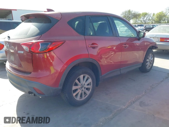 2013 Mazda CX-5 Touring with VIN JM3KE2CE9D0117750, listed as a IAAI auction lot 41858518 with 90,610 mi miles and . Bid and sale history available at carsss.com. Image 4.