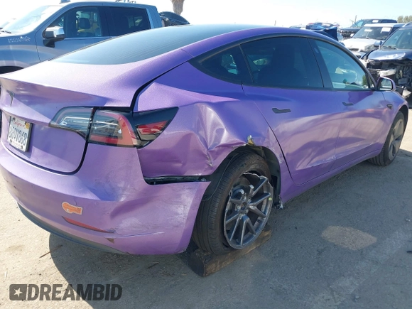 2020 Tesla Model 3 Standard Range Plus with VIN 5YJ3E1EA0LF739462, listed as a IAAI auction lot 42081889 with 65,254 mi miles. Bid and sale history available at carsss.com. Image 4.