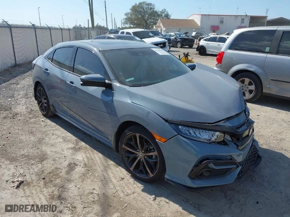 2021 Honda Civic Hatchback Sport Touring with VIN SHHFK7H94MU211384, listed as a IAAI auction lot 41705205 with 35,021 mi miles. Bid and sale history available at carsss.com. Image 1.