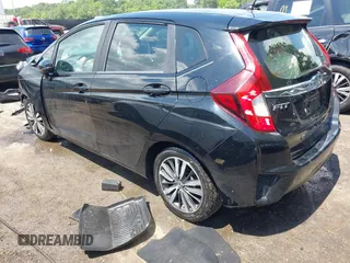 2015 Honda Fit EX-L with VIN 3HGGK5H81FM703713, listed as a IAAI auction lot 42525952 with 113,577 mi miles and . Bid and sale history available at DreamBid. Image 3.