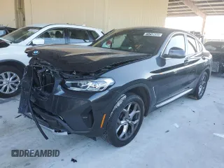 2022 BMW X4 xDrive30i z VIN 5UX33DT09N9L93053, wystawiony jako Copart lot #71710692 z przebiegiem Nie podano mil oraz . Historia ofert i sprzedaży dostępna na DreamBid. Obrazek 1.