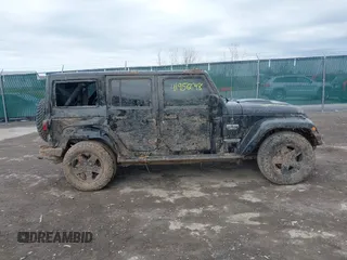 2012 Jeep Wrangler Unlimited Call of Duty MW3 z VIN 1C4BJWFG0CL202238, wystawiony jako IAAI lot #41956648 z przebiegiem 92 572 mil mil oraz . Historia ofert i sprzedaży dostępna na DreamBid. Obrazek 13.