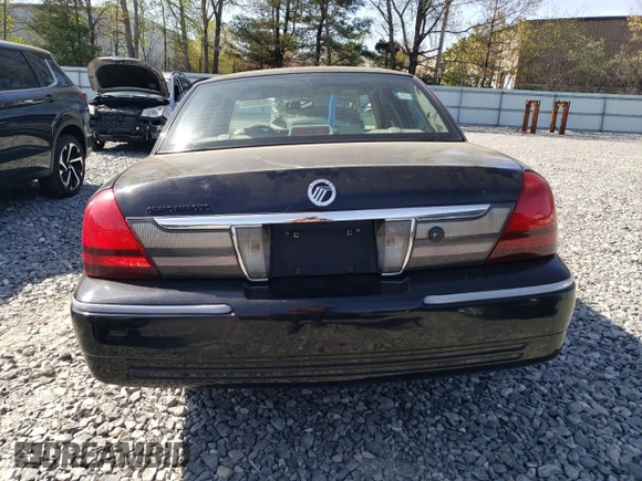 2010 Mercury Grand Marquis LS z VIN 2MEBM7FV8AX618001, wystawiony jako Copart lot #55382305 z przebiegiem 209 814 mil mil oraz Tytuł czysty. Historia ofert i sprzedaży dostępna na DreamBid. Obrazek 6.