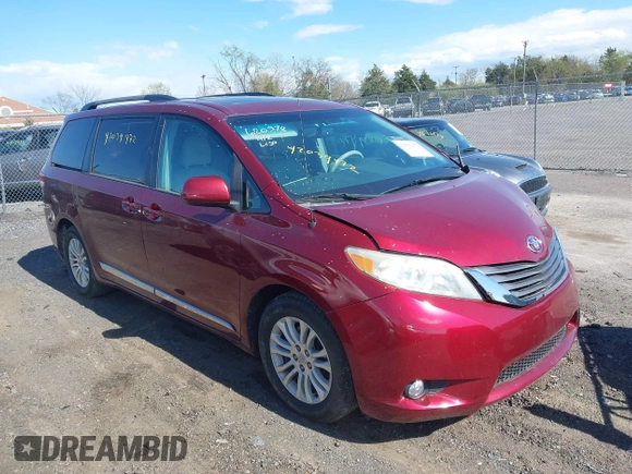 2014 Toyota Sienna XLE with VIN 5TDYK3DC8ES457940, listed as a IAAI auction lot 42039472 with 99,769 mi miles and . Bid and sale history available at DreamBid. Image 1.