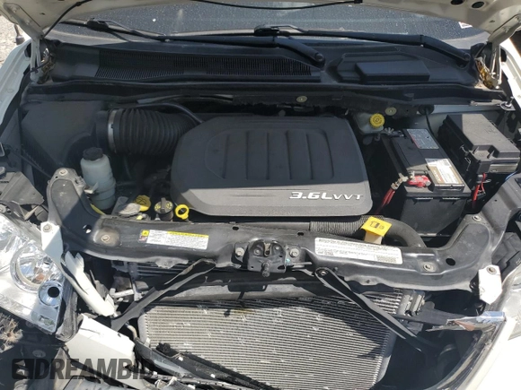 2011 Chrysler Town & Country Touring L z VIN 2A4RR8DG7BR783713, wystawiony jako Copart lot #57297455 z przebiegiem 148 455 mil mil oraz Szkoda całkowita • Salvage title. Historia ofert i sprzedaży dostępna na DreamBid. Obrazek 12.