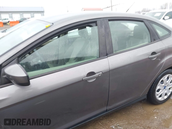 2012 Ford Focus SE with VIN 1FAHP3F26CL220986, listed as a IAAI auction lot 41719127 with 127,050 mi miles and . Bid and sale history available at DreamBid. Image 14.