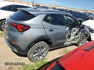 2023 Buick Encore GX Essence with VIN KL4MMGSL8PB056184, listed as a Copart auction lot 71814824 with 23,948 mi miles and Salvage title. Bid and sale history available at DreamBid. Image 3.