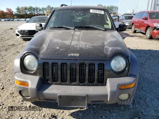 2003 Jeep Liberty Sport with VIN 1J4GL48K33W729978, listed as a Copart auction lot 76207834 with 104,992 mi miles and Clean Title. Bid and sale history available at carsss.com. Image 5.