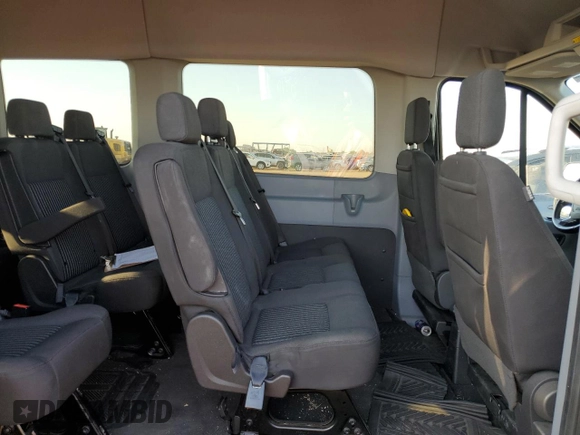 2018 Ford Transit Passenger XL with VIN 1FBVU4XG3JKA28907, listed as a Copart auction lot 69424444 with 61,411 mi miles and Salvage Title. Bid and sale history available at DreamBid. Image 11.