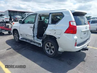 2012 Lexus GX 460 Premium z VIN JTJJM7FX0C5048317, wystawiony jako IAAI lot #42369797 z przebiegiem 195 737 mil mil oraz . Historia ofert i sprzedaży dostępna na DreamBid. Obrazek 3.