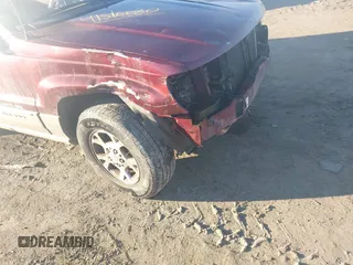 2000 Jeep Grand Cherokee Laredo with VIN 1J4GW48N3YC231743, listed as a IAAI auction lot 41316680 with Not provided miles and . Bid and sale history available at DreamBid. Image 6.