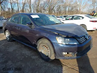 2014 Volkswagen Passat Wolfsburg Ed with VIN 1VWAT7A35EC114799, listed as a IAAI auction lot 41258718 with 85,345 mi miles. Bid and sale history available at carsss.com. Image 1.