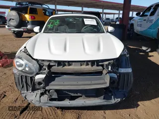 2018 FIAT 124 Spider Abarth z VIN JC1NFAEK9J0137571, wystawiony jako IAAI lot #42333604 z przebiegiem 31 532 mil mil oraz . Historia ofert i sprzedaży dostępna na DreamBid. Obrazek 13.