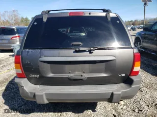 2004 Jeep Grand Cherokee Laredo with VIN 1J4GX48N14C435481, listed as a Copart auction lot 87855975 with 176,273 mi miles and Salvage Title. Bid and sale history available at carsss.com. Image 6.
