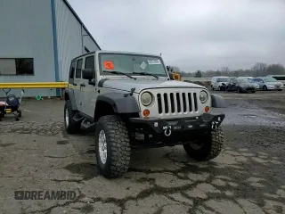 2007 Jeep Wrangler Unlimited X with VIN 1J4GA39177L105582, listed as a Copart auction lot 88912935 with 156,156 mi miles and Salvage Title. Bid and sale history available at DreamBid. Image 12.