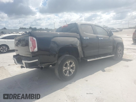 2015 GMC Canyon 2WD SLT with VIN 1GTG5CE31F1263234, listed as a Copart auction lot 76512794 with 113,180 mi miles and Salvage Title. Bid and sale history available at carsss.com. Image 3.