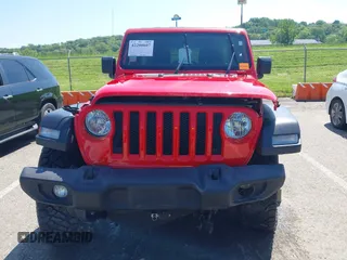 2018 Jeep Wrangler Unlimited Sport S z VIN 1C4HJXDGXJW168940, wystawiony jako IAAI lot #42200607 z przebiegiem 60 308 mil mil oraz . Historia ofert i sprzedaży dostępna na DreamBid. Obrazek 12.