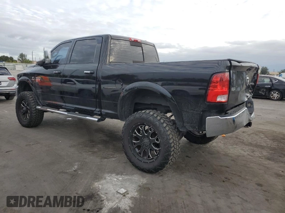 2012 Ram 2500 Laramie with VIN 3C6UD5FL2CG199239, listed as a Copart auction lot 87841525 with 83,183 mi miles and Salvage Title. Bid and sale history available at carsss.com. Image 2.