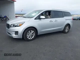 2016 Kia Sedona LX with VIN KNDMB5C10G6148931, listed as a IAAI auction lot 41799548 with 76,307 mi miles. Bid and sale history available at carsss.com. Image 2.
