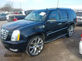 2007 Cadillac Escalade z VIN 1GYFK63857R153210, wystawiony jako IAAI lot #41704106 z przebiegiem 291 658 mil mil oraz . Historia ofert i sprzedaży dostępna na DreamBid. Obrazek 2.