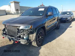 2018 Jeep Grand Cherokee Trailhawk with VIN 1C4RJFLT9JC244212, listed as a IAAI auction lot 41443469 with 77,953 mi miles and . Bid and sale history available at DreamBid. Image 18.