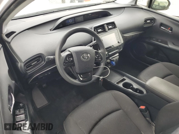 2021 Toyota Prius L Eco z VIN JTDKAMFU6M3140307, wystawiony jako Copart lot #58436795 z przebiegiem 53 151 mil mil oraz Szkoda całkowita • Salvage title. Historia ofert i sprzedaży dostępna na DreamBid. Obrazek 8.