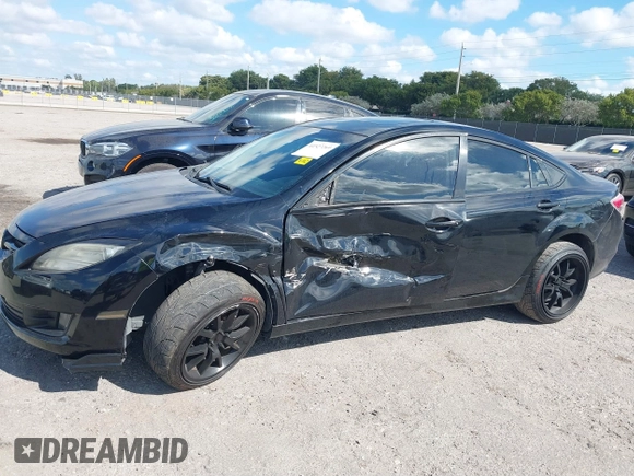 2009 Mazda 6 S Grand Touring with VIN 1YVHP82BX95M21939, listed as a IAAI auction lot 41527269 with 154,544 mi miles and . Bid and sale history available at DreamBid. Image 6.